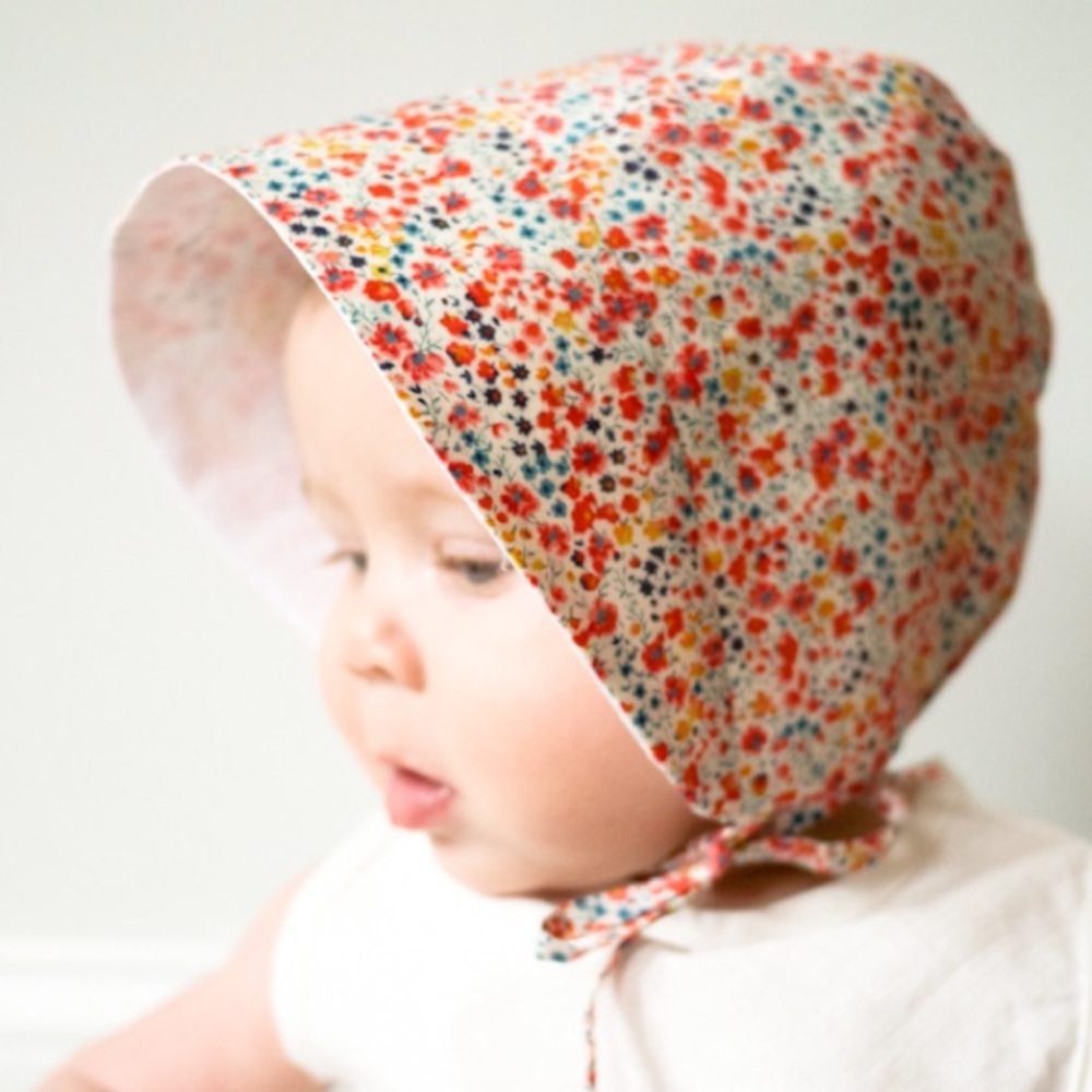 Cotton reversible sun bonnet with chin strap. Handmade washable. Fits most bears